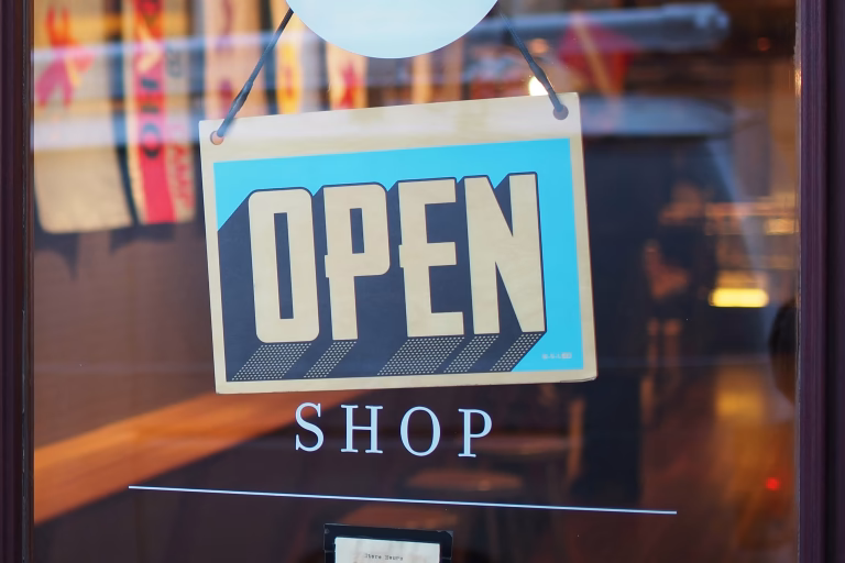 Open sign in a shop window.